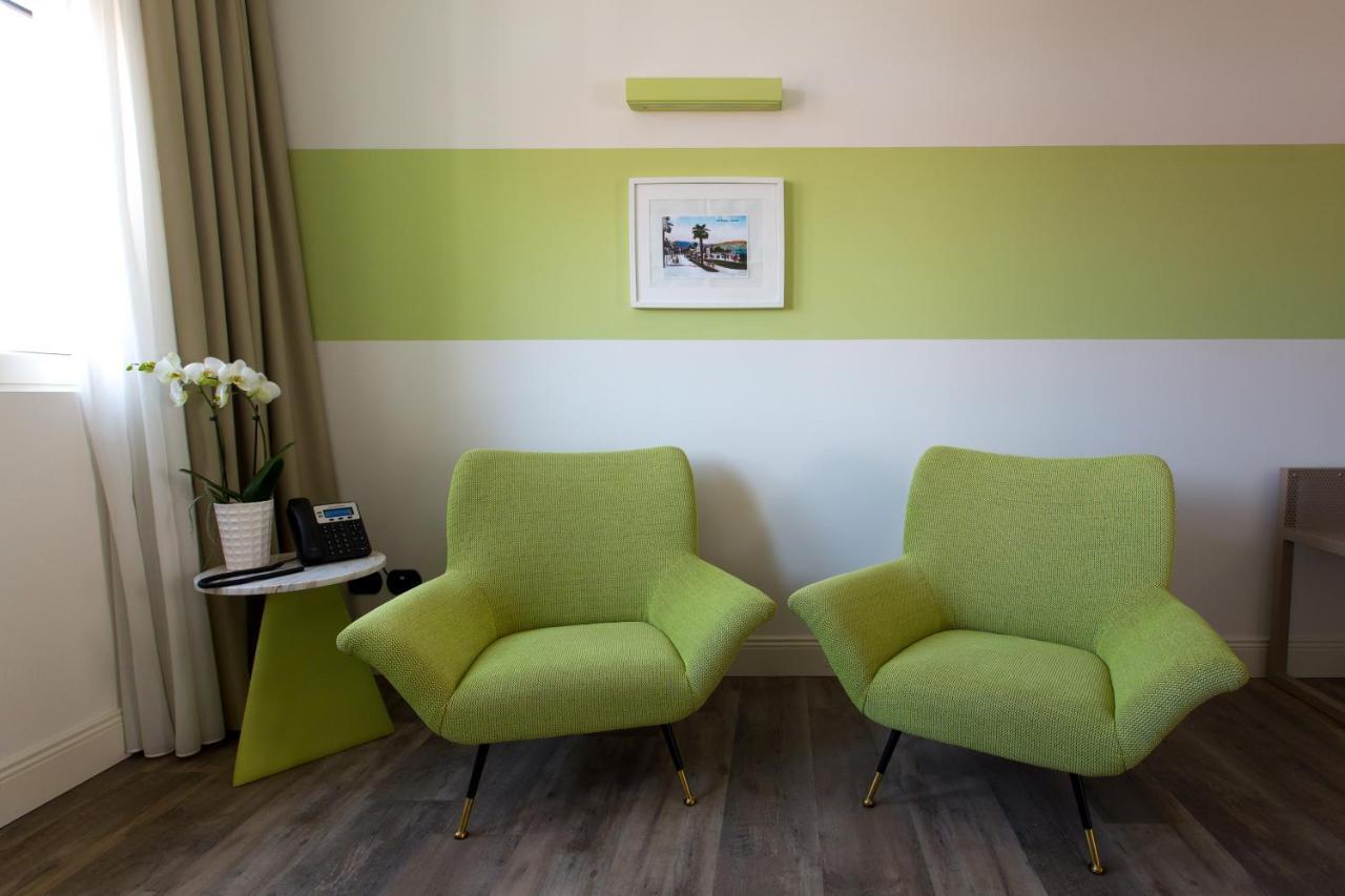 Hotel Al Campanile - Luxury Suites & Apartments Baveno Bagian luar foto